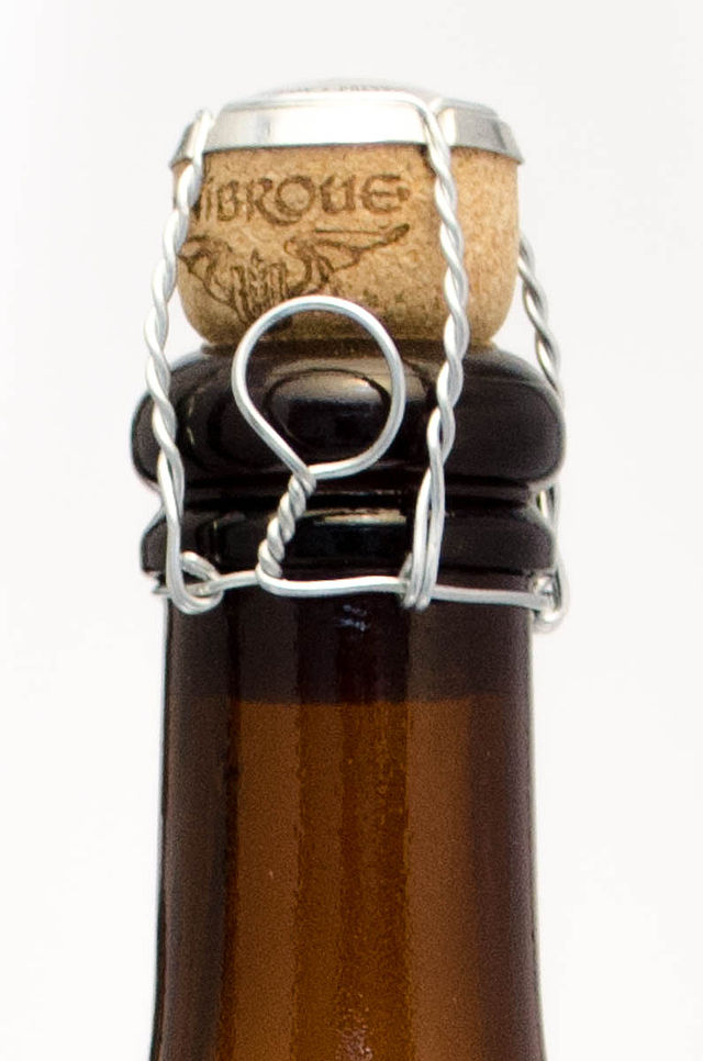 Beer bottle sealed with a cork and muselet